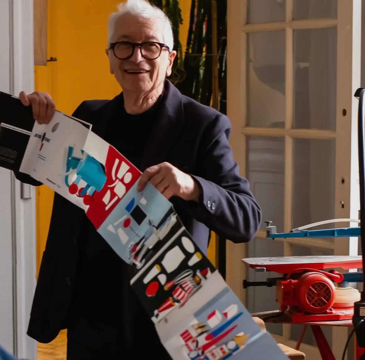 Gérard Lo Monaco with Jeux D'enfance Leporello Pop-Up Book.