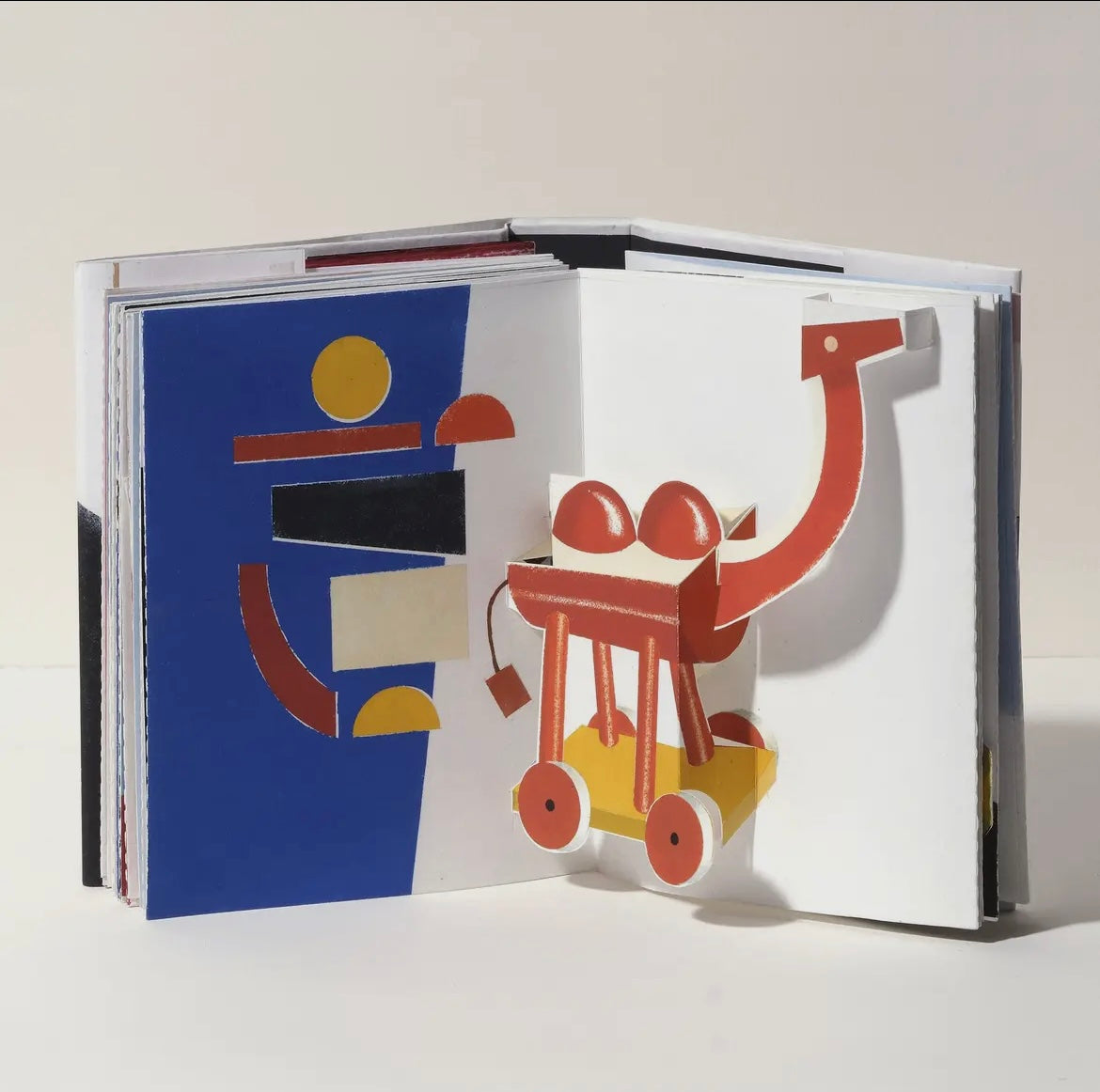 Gérard Lo Monaco - Jeux D'enfance Leporello Pop-Up Book. Inner pop-out page.Wooden animal